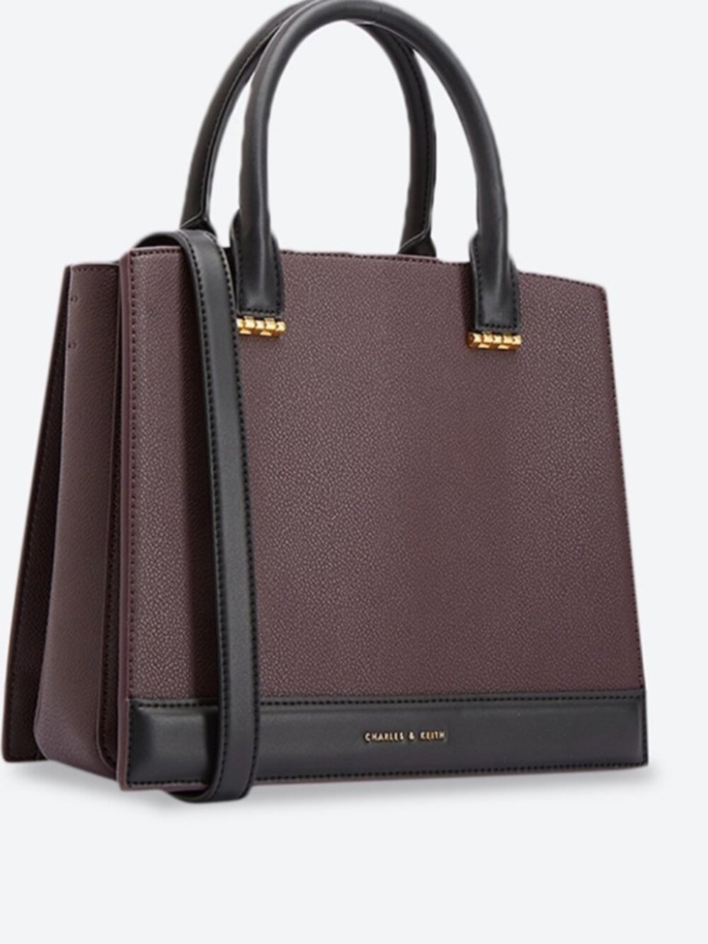 Charles and Keith handbag or crossbody in Dark Purple and Black leather